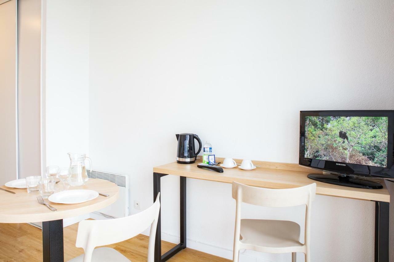 Comfort Aparthotel Le Mans Bagian luar foto